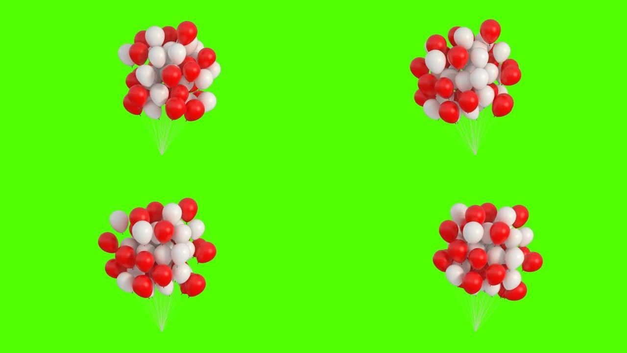 红白相间的气球在绿底风中摇曳