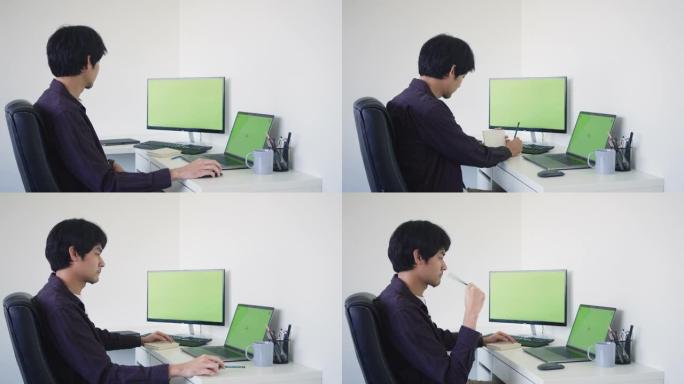 商人在办公室工作时使用计算机