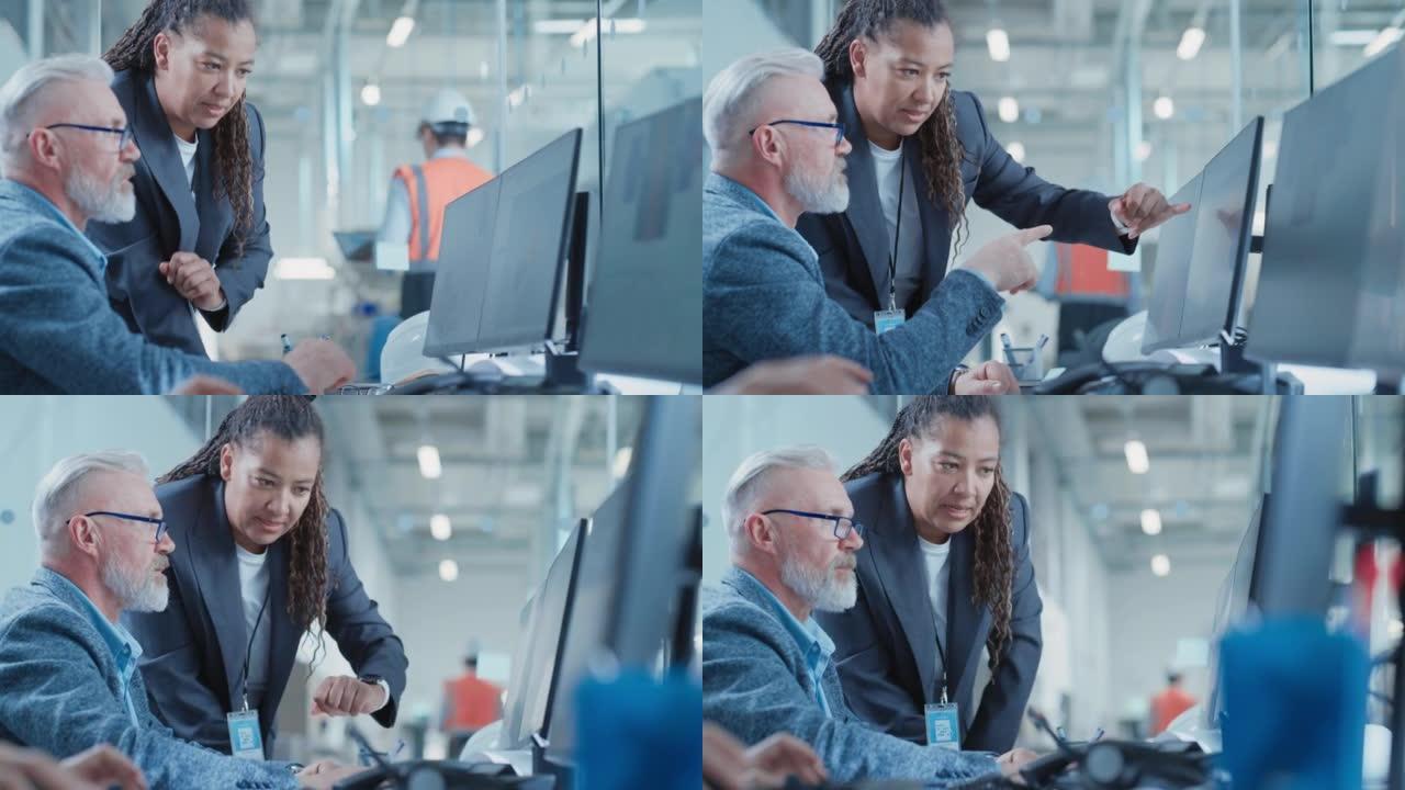 工厂办公设施: 工业工程师在计算机cad软件上起草重工业机器零件的蓝图。非裔美国技术人员与中年设计师