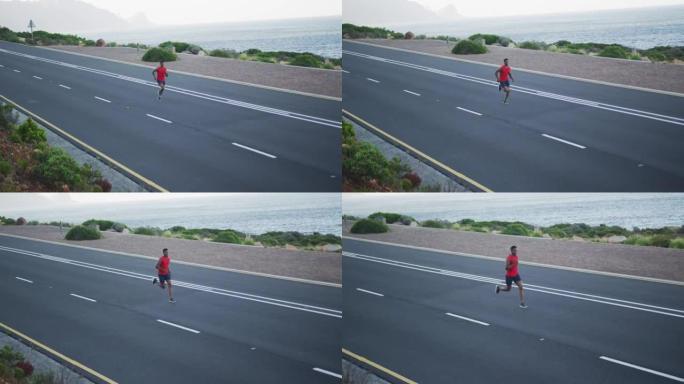 非裔美国男子在沿海公路上户外运动