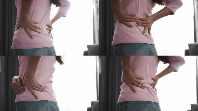 背痛的特写女人背痛捂背