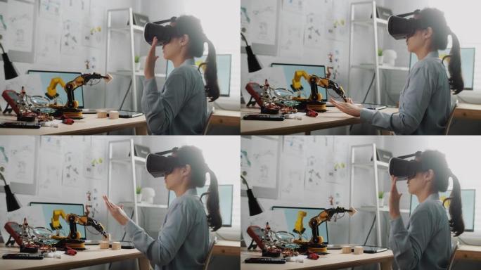 工程师戴着虚拟现实耳机，坐在办公桌前工作时打手势