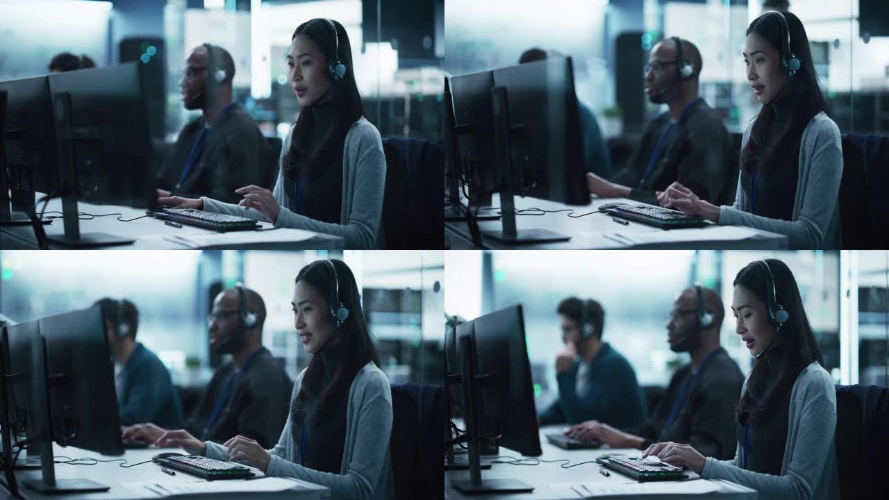 服务台专家接听电话，为遇到计算机硬件和软件问题的客户提供技术支持。亚洲女性使用耳机与技术团队交谈