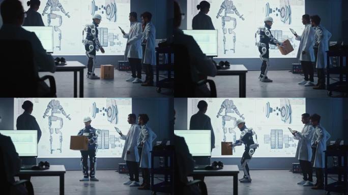 在开发实验室中: 工程师们正在研究机器人外骨骼原型演示，并进行人员测试，举起沉重的纸板箱。设计可穿戴
