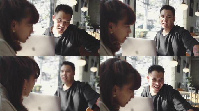 亚洲商人在咖啡馆聚会