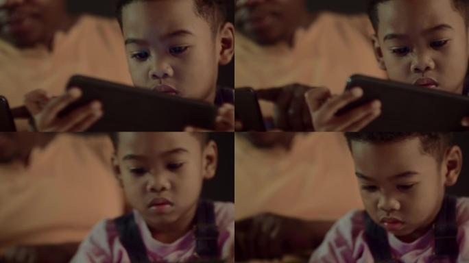 不快乐的男孩父亲儿子智能手机黑人互联网