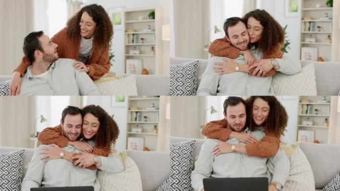 笔记本电脑，自由职业者和一对情侣在家里的客厅里拥抱在一起。拥抱，亲吻和一个女人拥抱她的商人，同时在他