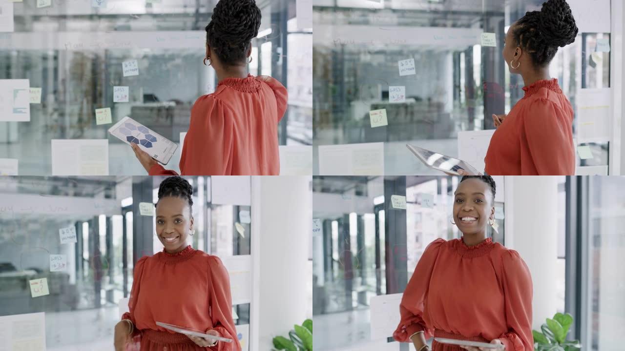 一位年轻的女商人使用数字平板电脑进行头脑风暴的4k视频片段，并在办公室的玻璃墙上进行笔记