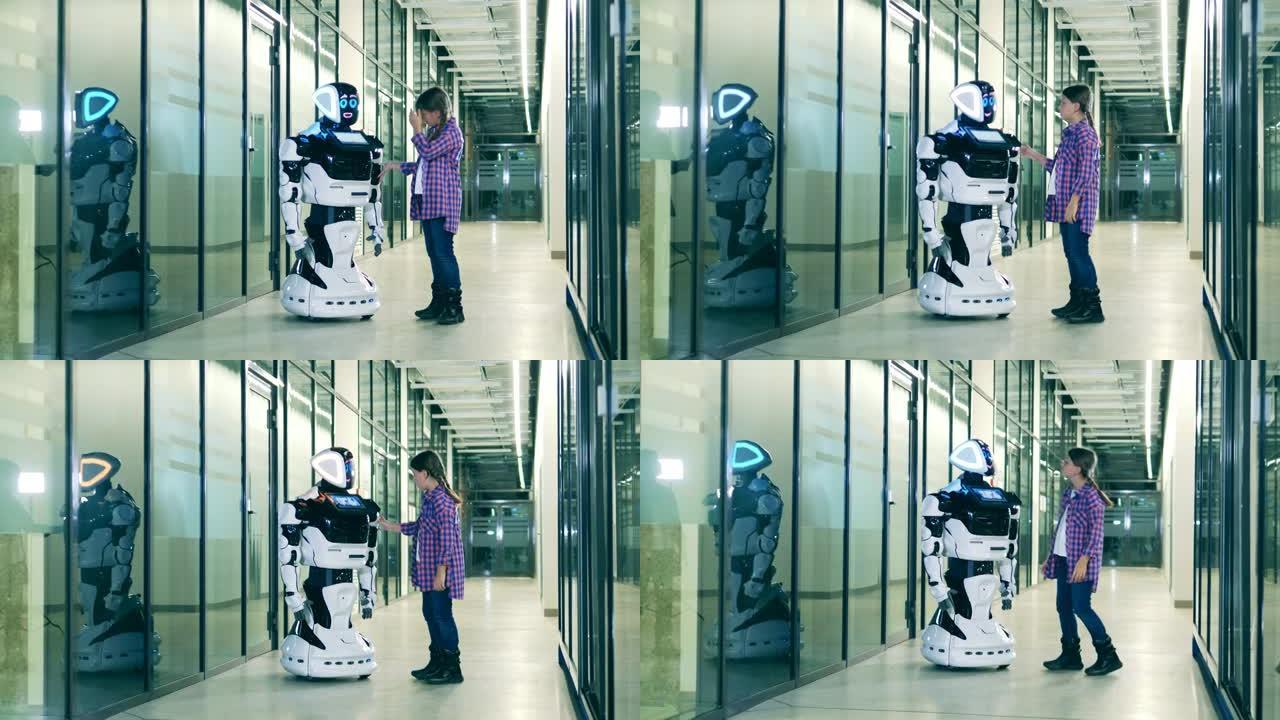 小女孩和一个未来派机器人说话。机器人科学、技术、创新概念。