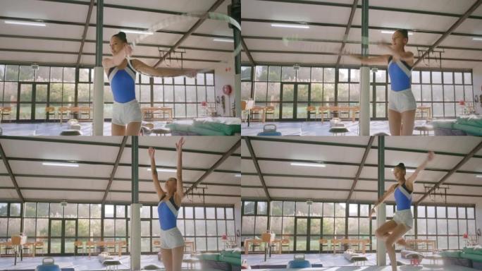 体操训练，指环舞和女子在健身房进行专业比赛的舞蹈表演，并为俱乐部活动进行创意舞蹈。带呼啦圈的体操舞者