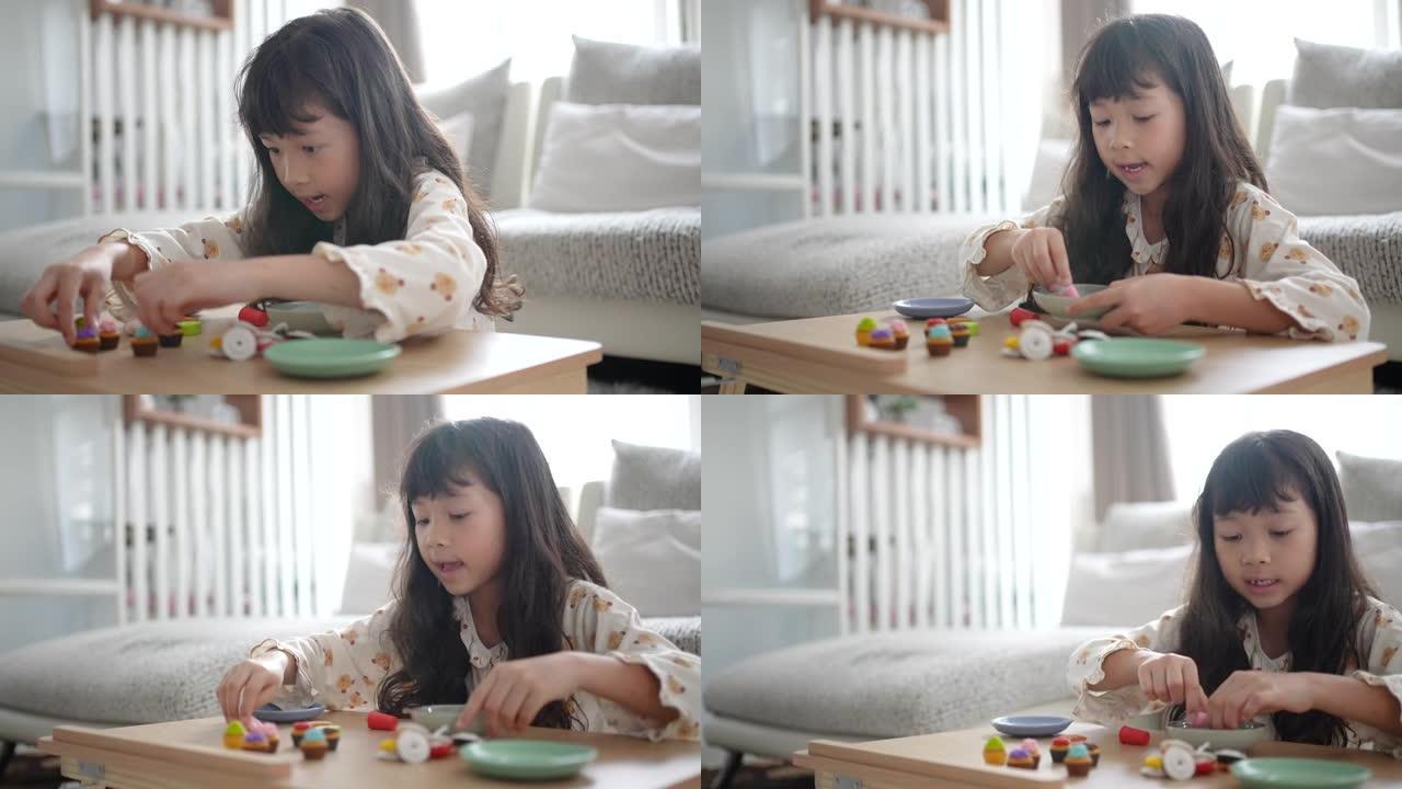 小女孩在家里玩她的玩具