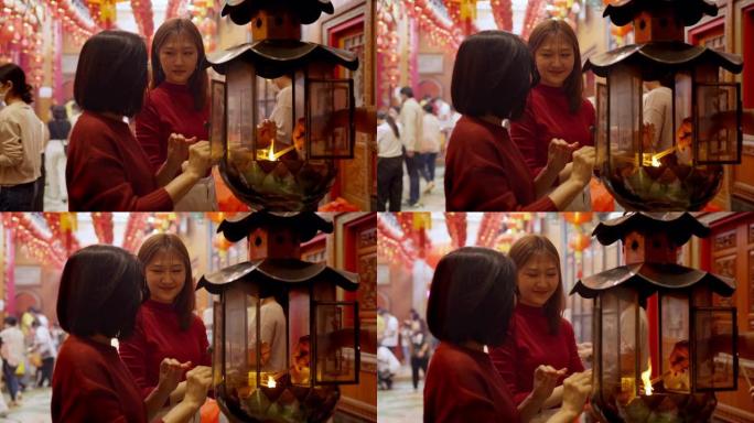 亚洲家庭在中国新年拜佛，