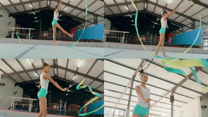 女子，体操和能量丝带舞在跳台运动，体育场的训练和健身锻炼中。奥林匹克运动员，舞蹈演员和运动健美操女孩