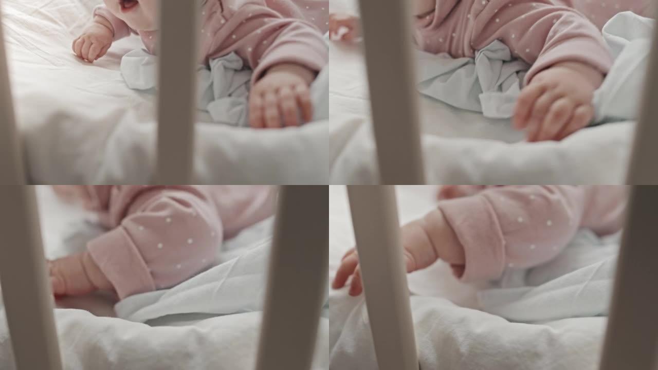 婴儿床中的婴儿手小婴儿婴儿床婴儿车