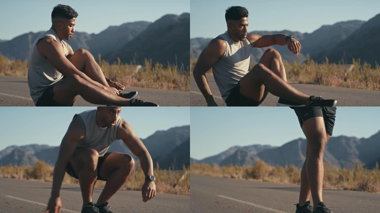 4k视频片段，一个年轻人在乡下的道路上奔跑之前系鞋带