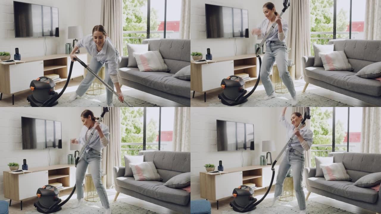 年轻女子在公寓里用吸尘器打扫和跳舞。开朗的女性在家做家务时听音乐。精力充沛的女性在春季打扫休息室