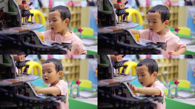 玩玩具车的小男孩小男孩玩玩具特写视频素材