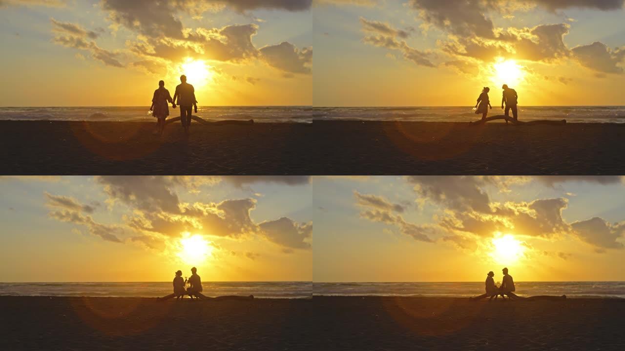 意大利撒丁岛海滩上一对夫妇的慢动作视图。