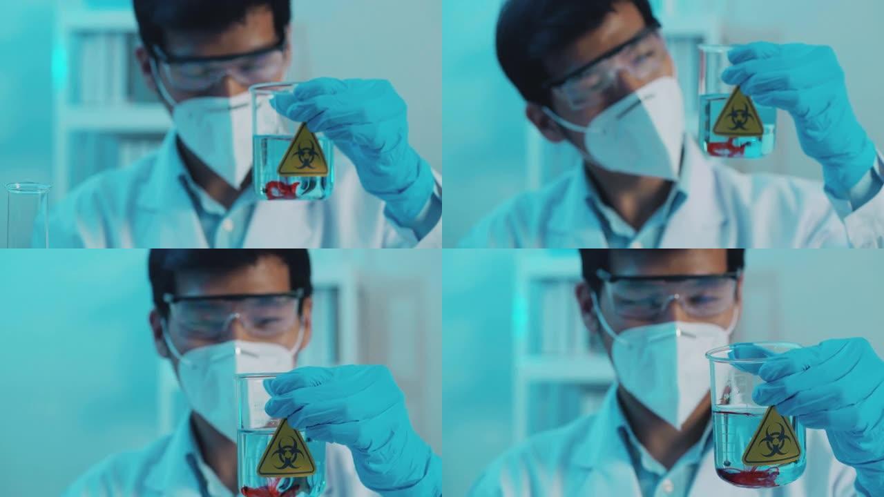 亚洲科学家，年轻男性，32岁，实验室生物学家进行实验，测试Covid-19疫苗冠状病毒。科学实验室的
