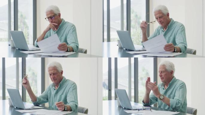 一个成熟的男人在使用笔记本电脑时阅读文书工作的4k视频片段