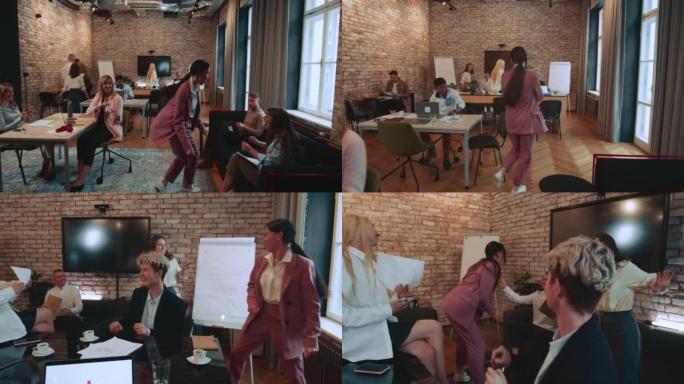 镜头跟随年轻兴奋的粉红色西装女商人进入办公室，在取得巨大成功后进行有趣的庆祝舞蹈散步。