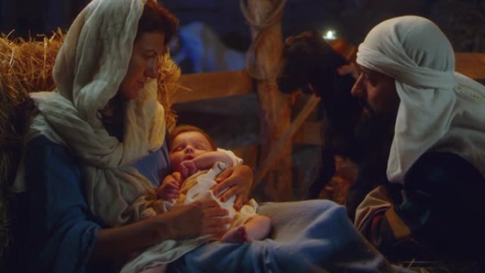 约瑟夫和羔羊在玛丽和婴儿耶稣旁边