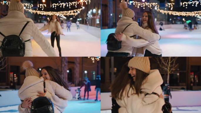 两名年轻女子在溜冰场上滑冰时拥抱