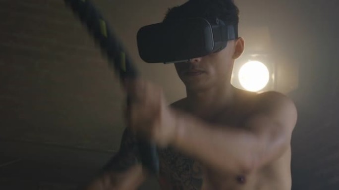 年轻人在检疫期间用VR未来派护目镜训练战绳训练。创新概念。