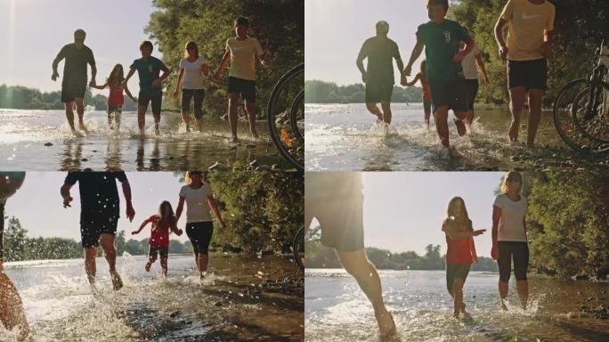 SLO MO一家带着三个孩子在河的浅水中奔跑