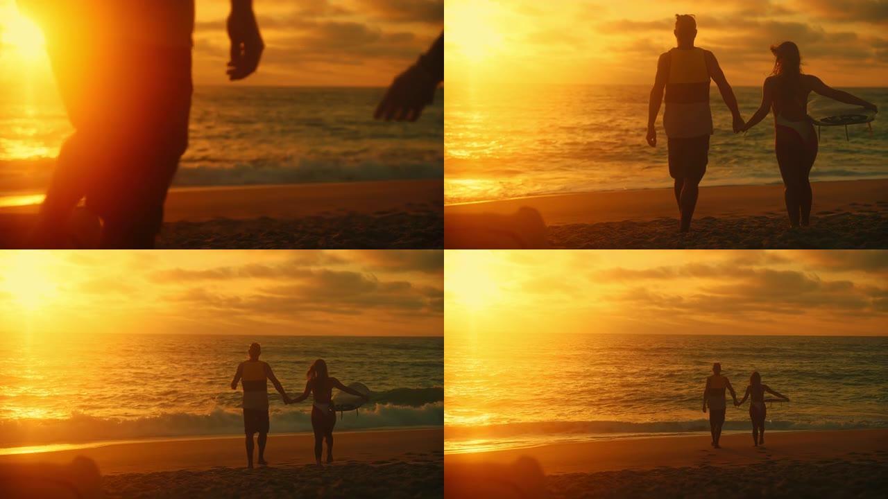 在美丽的日落时分，一对夫妇手牵手从海滩走到海边，女人拿着冲浪板
