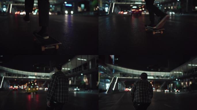 一个男人晚上在街上玩滑板