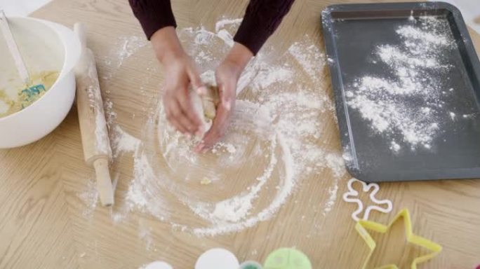 4k视频片段，一个无法识别的女人在家里制作圣诞节饼干