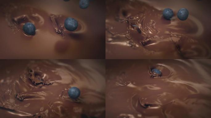 蓝莓在4k超级慢动作中落入液体巧克力中