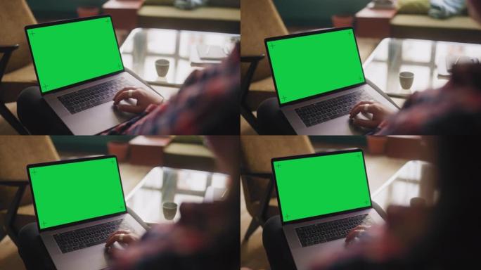 音乐家在家用笔记本电脑工作-色度键绿色屏幕