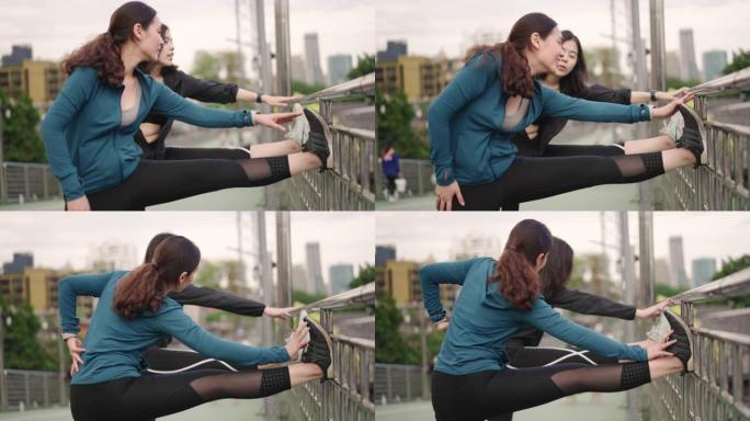 两名亚洲体育女性在城市一起锻炼