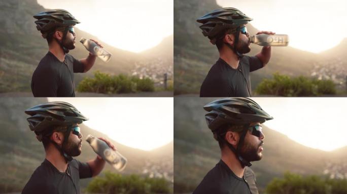 健身，休息和男性骑自行车的人在大自然中骑自行车时喝水。运动，锻炼和耐力，在竞技有氧运动过程中，用瓶中