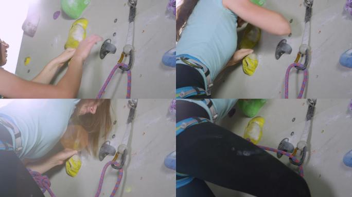 特写: 年轻的高加索女孩将她的绑绳快速拉入登山扣。
