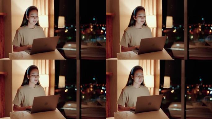 美女戴着面膜在笔记本电脑上玩社交媒体。