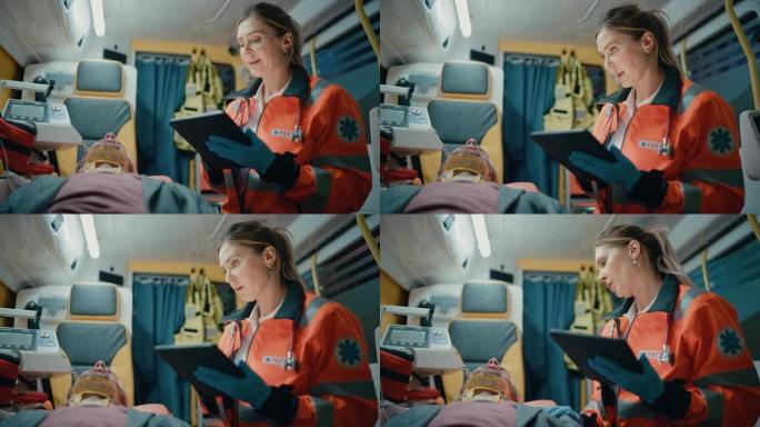 女性EMS专业护理人员使用平板电脑为受伤患者在去医院的途中填写问卷。急救助理在救护车上安慰病人。
