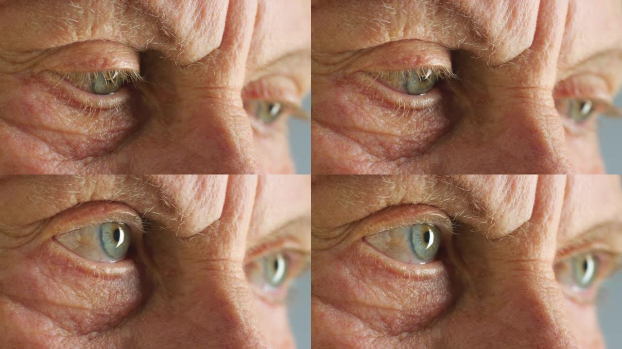 高级男子，蓝眼睛或悲伤和思考过去的记忆，患有精神卫生或焦虑倦怠。视力缩放，退休老人的纹理或面部皮肤压