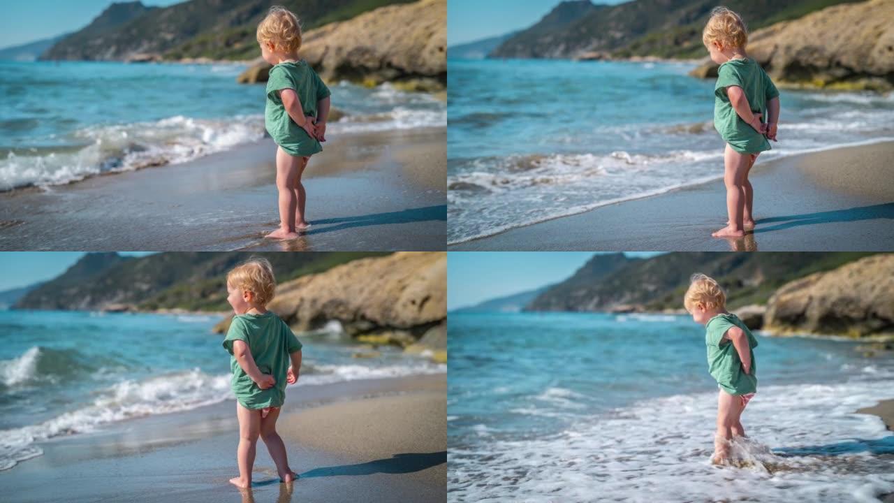 小男孩在沙滩上，脚在冲浪