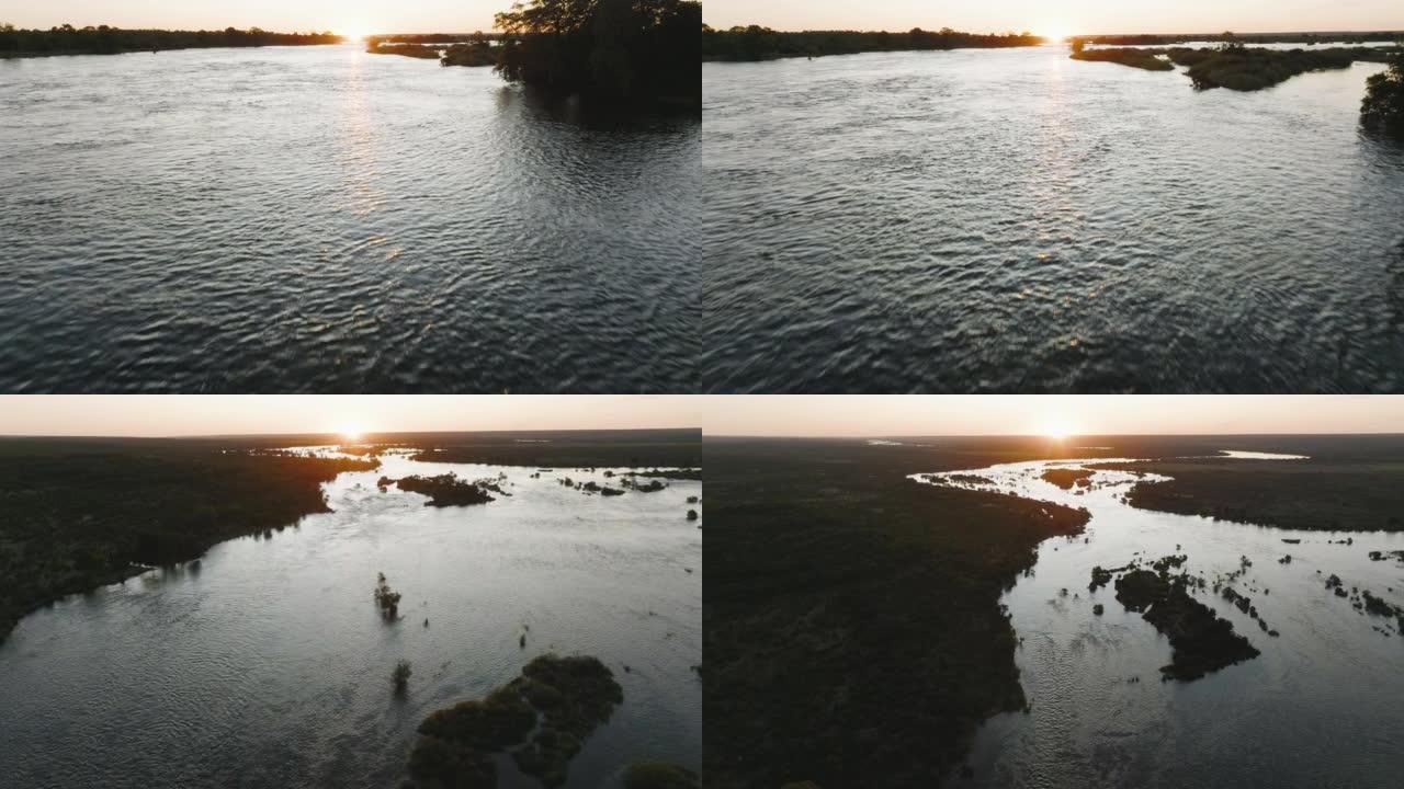 空中日出倾斜的太阳升起在强大的赞比西河上