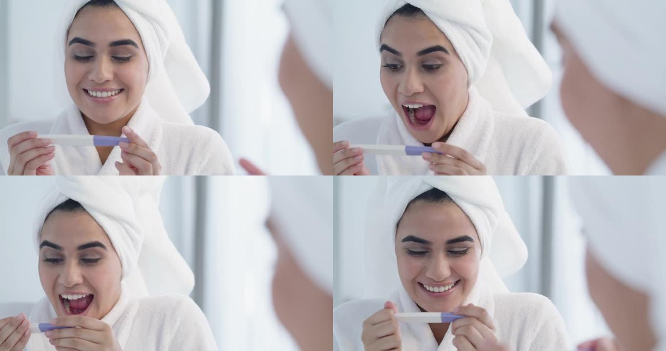 4k视频片段，一名年轻女性在家里的浴室里阅读怀孕测试