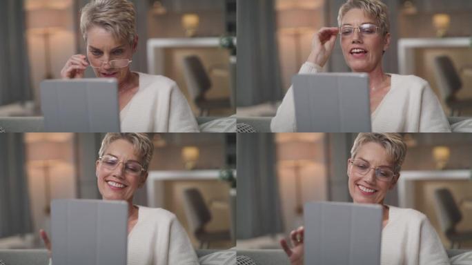 4k视频片段，一名高级女性在数字平板电脑上进行视频通话