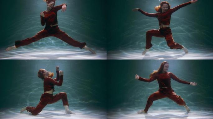 幸福概念。电影拍摄的年轻美丽快乐的红发女人在水下慢动作下做有趣的舞蹈动作。