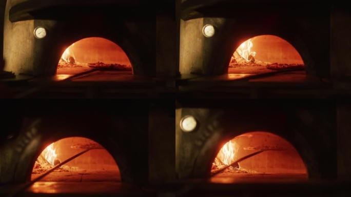 在餐厅披萨皮将披萨转移到木火石烤箱中。传统烹饪，意大利家庭食谱。正宗的比萨店，有美味的有机食品。电影