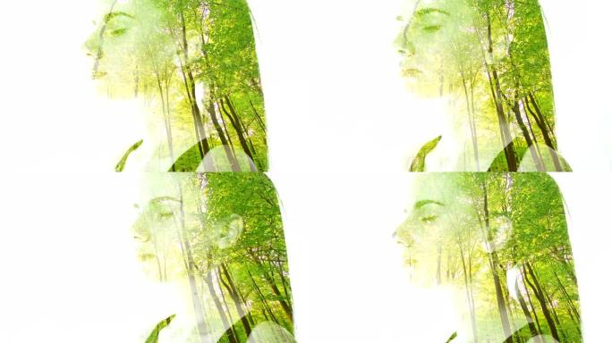 MS在绿色森林上叠加了一个年轻的冥想女人的双重曝光