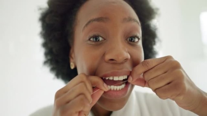Black woman use dental floss, care for teeth welln
