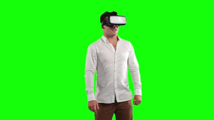 在绿色背景中戴着3D护目镜的白人男子的动画