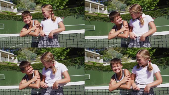 站在网球场上的高加索兄弟姐妹一起微笑的肖像